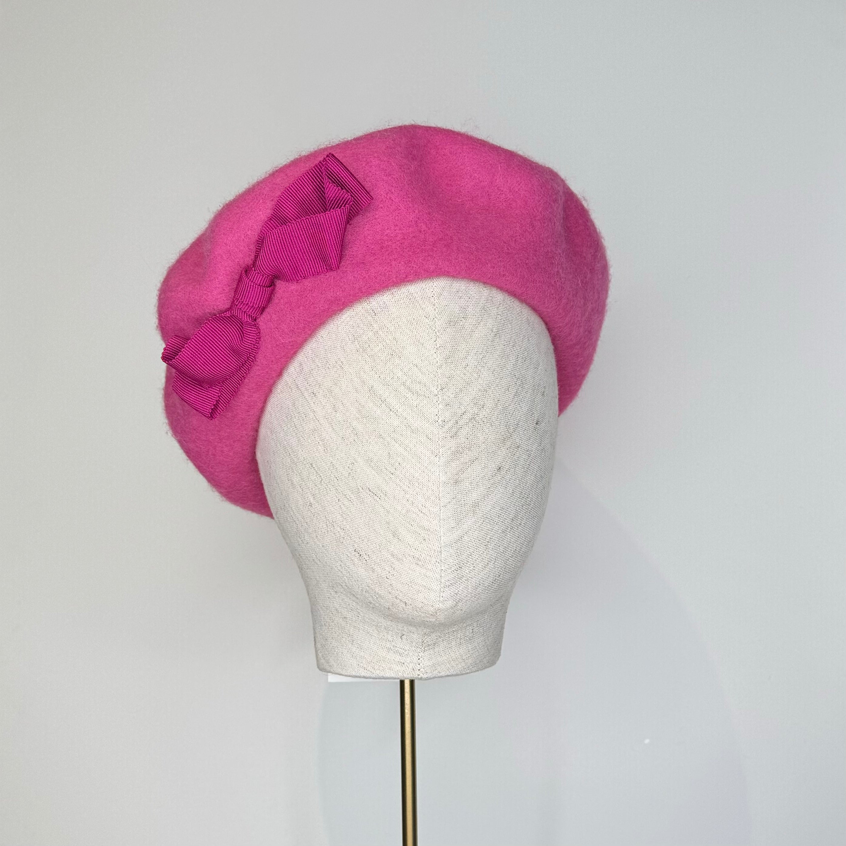 Pink beret with bow