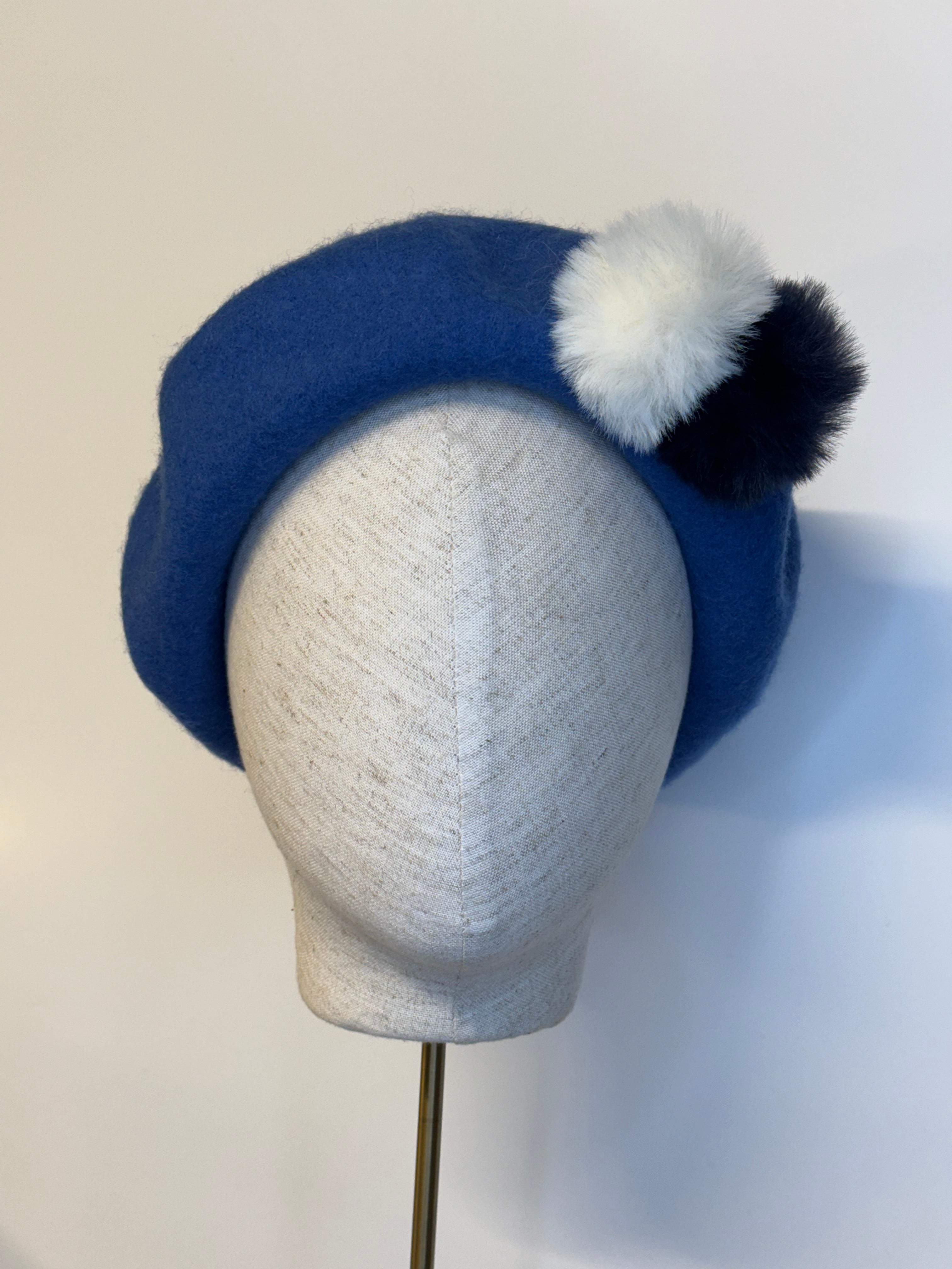 Sky blue beret with Pom Poms